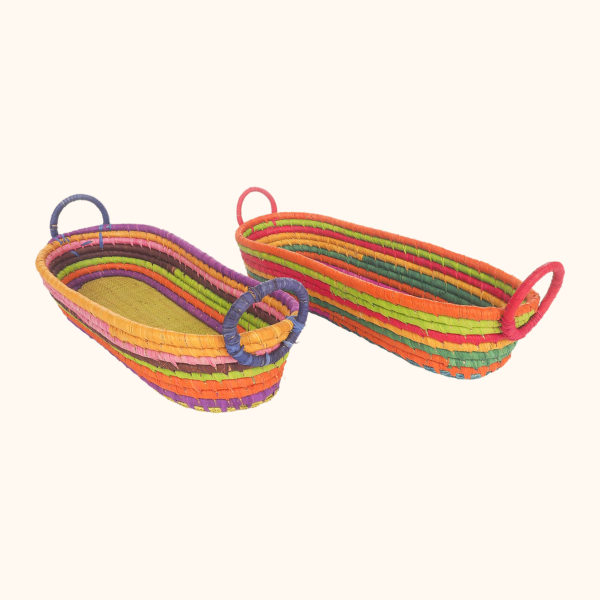 Multicolour bread baskets made with raffia and straw, cut out photo