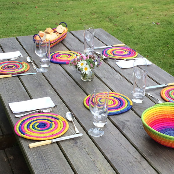 Multicolour bread basket with matching placemats and fruit bowl