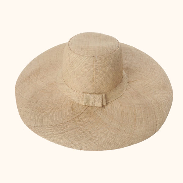 Flat Wide Brim Raffia Hat in natural, cut out photo