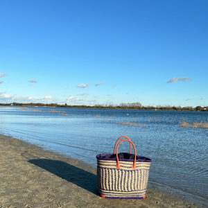 Large drawstring shopper in blue out for a picnic by the sea