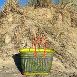 Large drawstring shopper in lime and navy at the beach