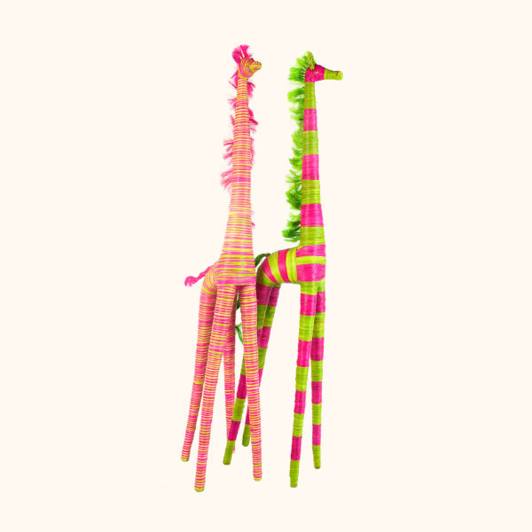 Large green and pink raffia giraffes, cut out photo