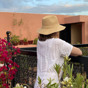 Natural raffia Panama sun hat being worn in a raid in Marrakesh
