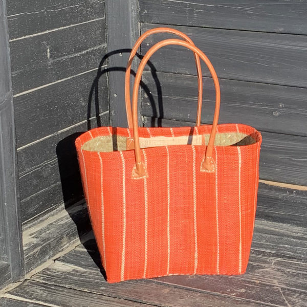 Orange Pinstripe Basket Bag at the beach