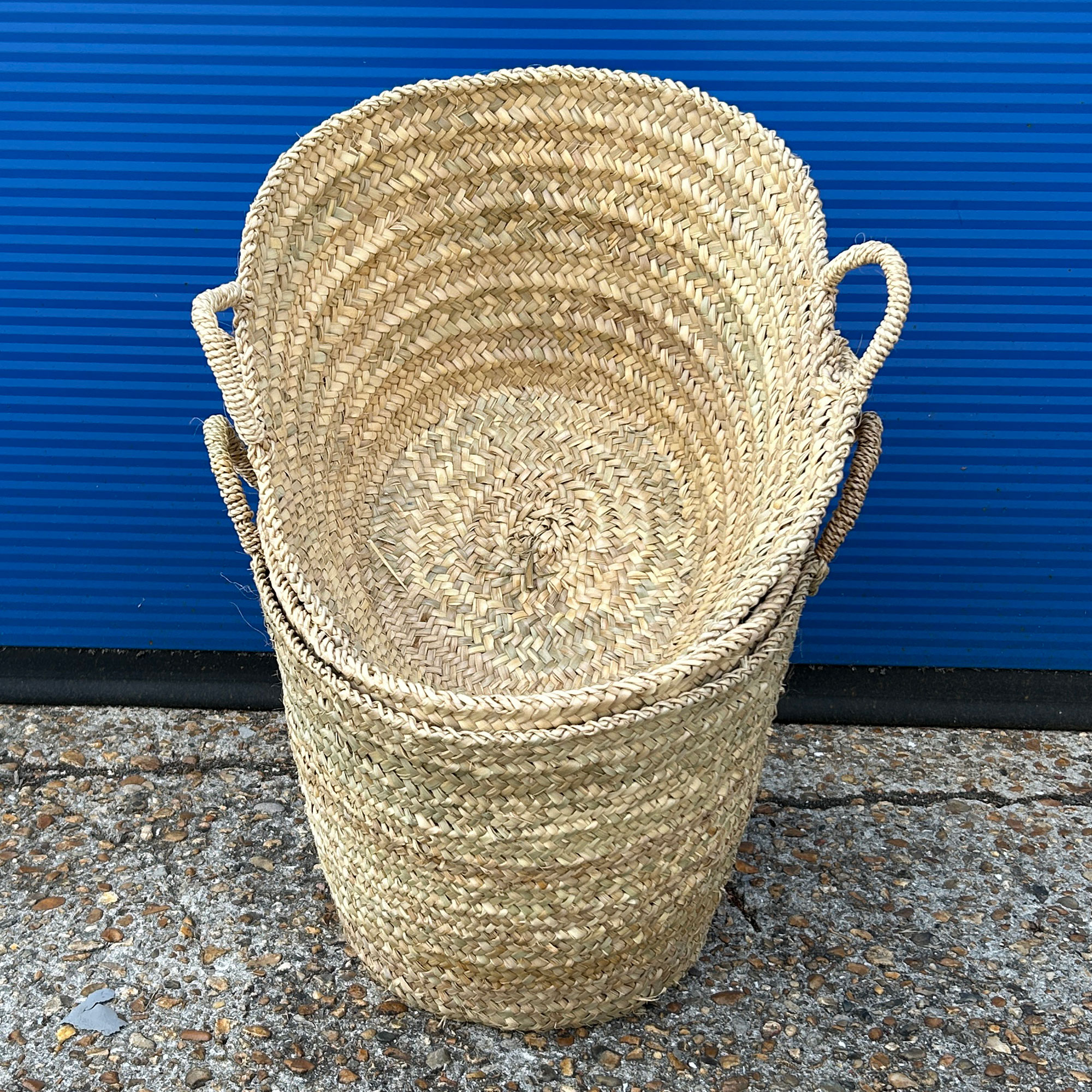 Stack of small Berber storage baskets on sale