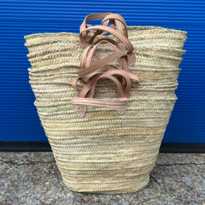 Stack of small Large French Baskets on sale