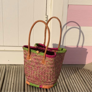 Small lime and pink bosaka basket bag by beach hut