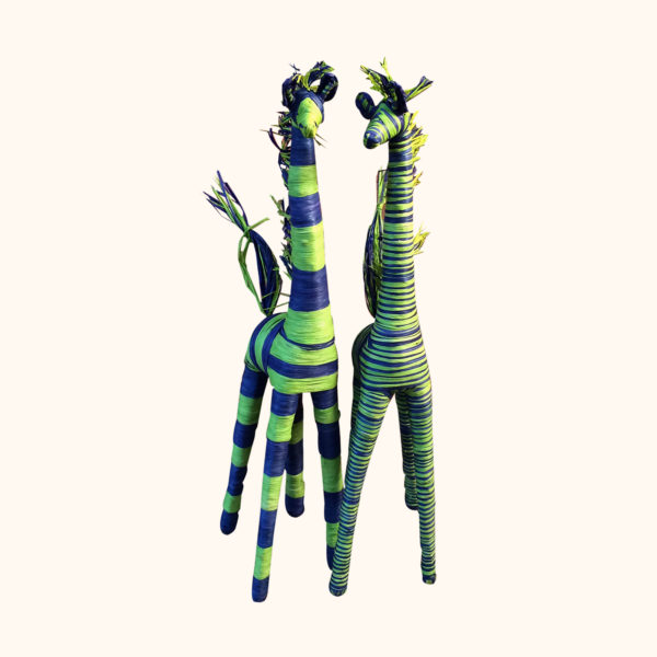 Small green and blue raffia giraffes, cut out photo