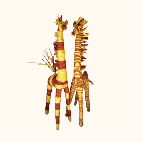 Small yellow and brown raffia giraffes, cut out photo