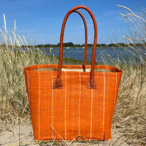 Small pinstripe basket bag by the sea