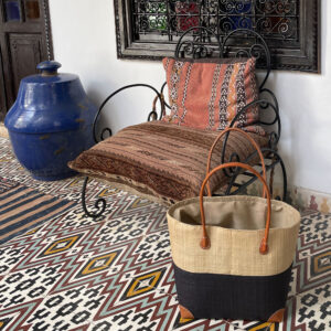 Large Hanta two tone bag in black at a road in Marrakesh