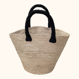 Crochet bucket bag in natural with black handles cut out photo