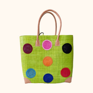 Large raffia tote bag with circles on both sides in lime, cut out photo