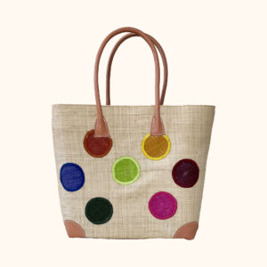 Large raffia tote bag with circles on both sides in natural, cut out photo