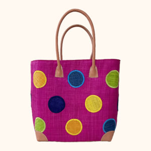 Large raffia tote bag with circles on both sides in pink, cut out photo