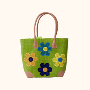 Large raffia tote bag with flowers on both sides in lime green, cut out photo