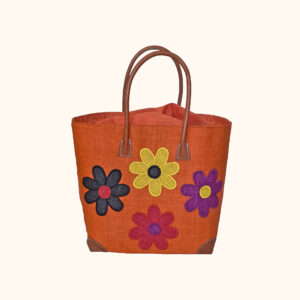 Large orange raffia tote bag with flowers embroidered on both sides cut out photo