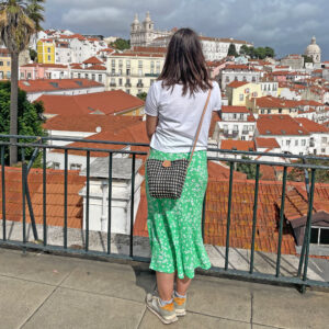 Plus Plus Handbag in black being worn in Lisbon on a city break