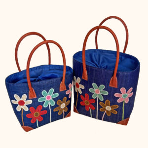 Set of 2 embroidered flower stem tote bags in navy - cut out photo