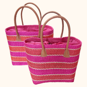 Striped sisal tote bags in orange and pink cut out photo