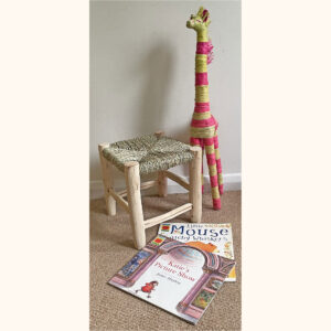 Little Rustic Wooden Stool with a small raffia giraffe and children's books