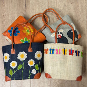 Two pairs of embroidered tote bags - flowers and dog/butterflies