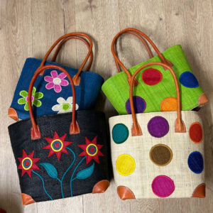 Two pairs of embroidered tote bags - flowers and circles