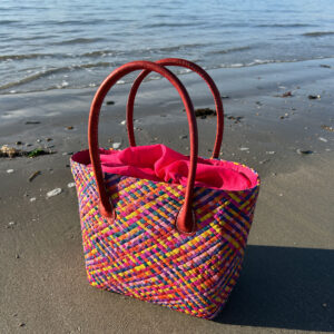 Camille raffia tote bag in pink multicolours at the seaside
