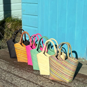 Little Lille Handbags - 6 colour options beside a beach hut - new for 2026